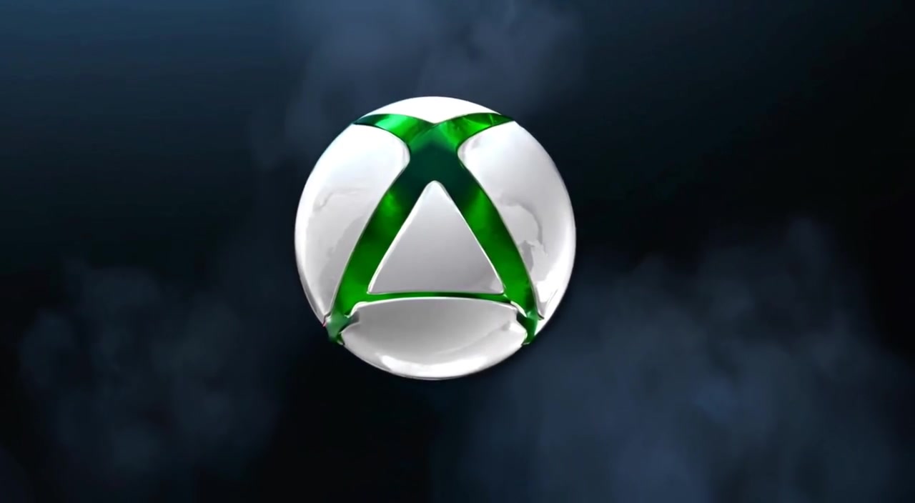 The Xbox logo gently spins, revealing its sleek angles against a dark, atmospheric background.
