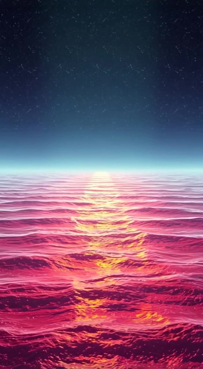Gentle waves ripple across the ocean, showcasing vibrant layers of color in the tranquil waters.