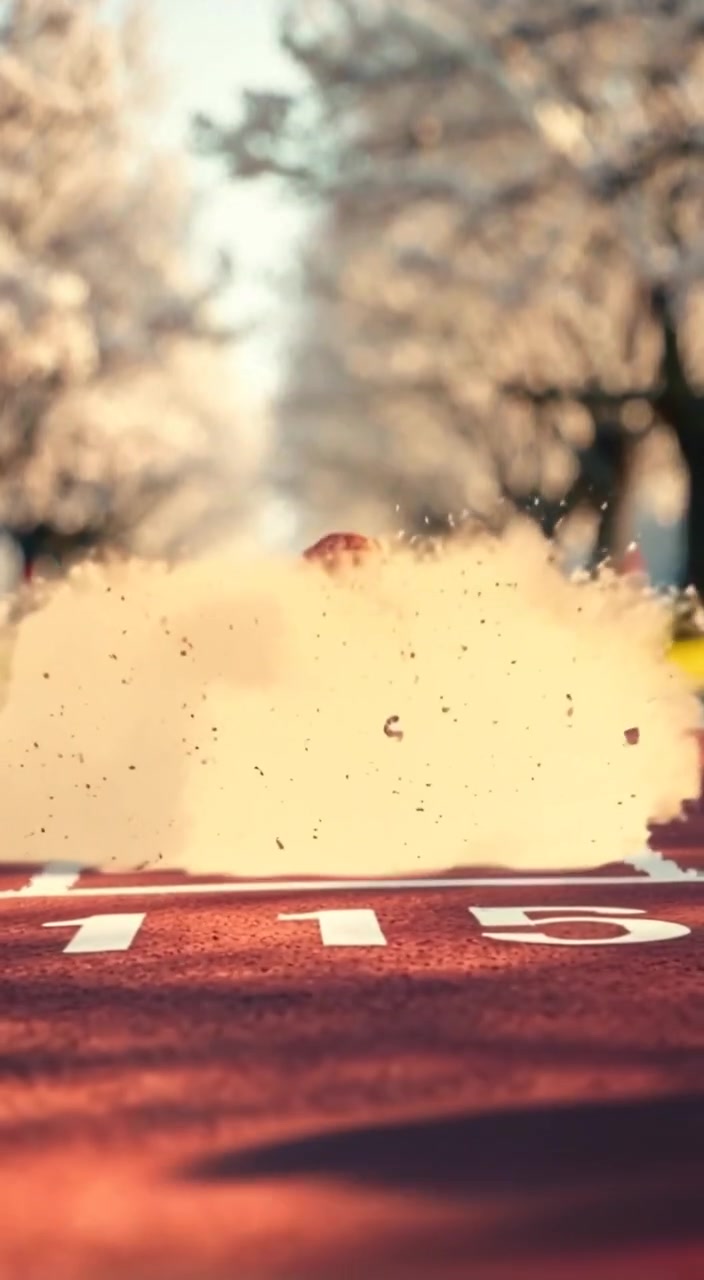The shoes confidently cross the finish line, dust gently rising from the track.