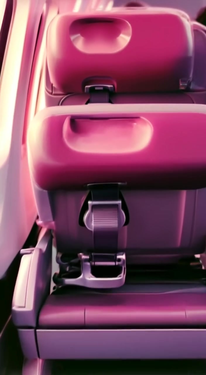 The airplane cabin shifts gently as passengers settle in, focusing on a seatbelt securely fastened, ready for takeoff.