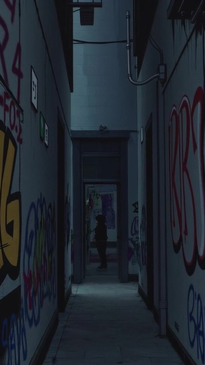 Scene: A dark, gritty alleyway adorned with vibrant graffiti, illuminated by sparse overhead lights casting ominous shadows. Style: Moody lighting enhances the atmosphere, creating sharp contrasts between light and darkness. Motion: Camera slowly pushes in towards the shadowy figure in the background, revealing its intricate surroundings as it draws closer, heightening the suspense of the scene.