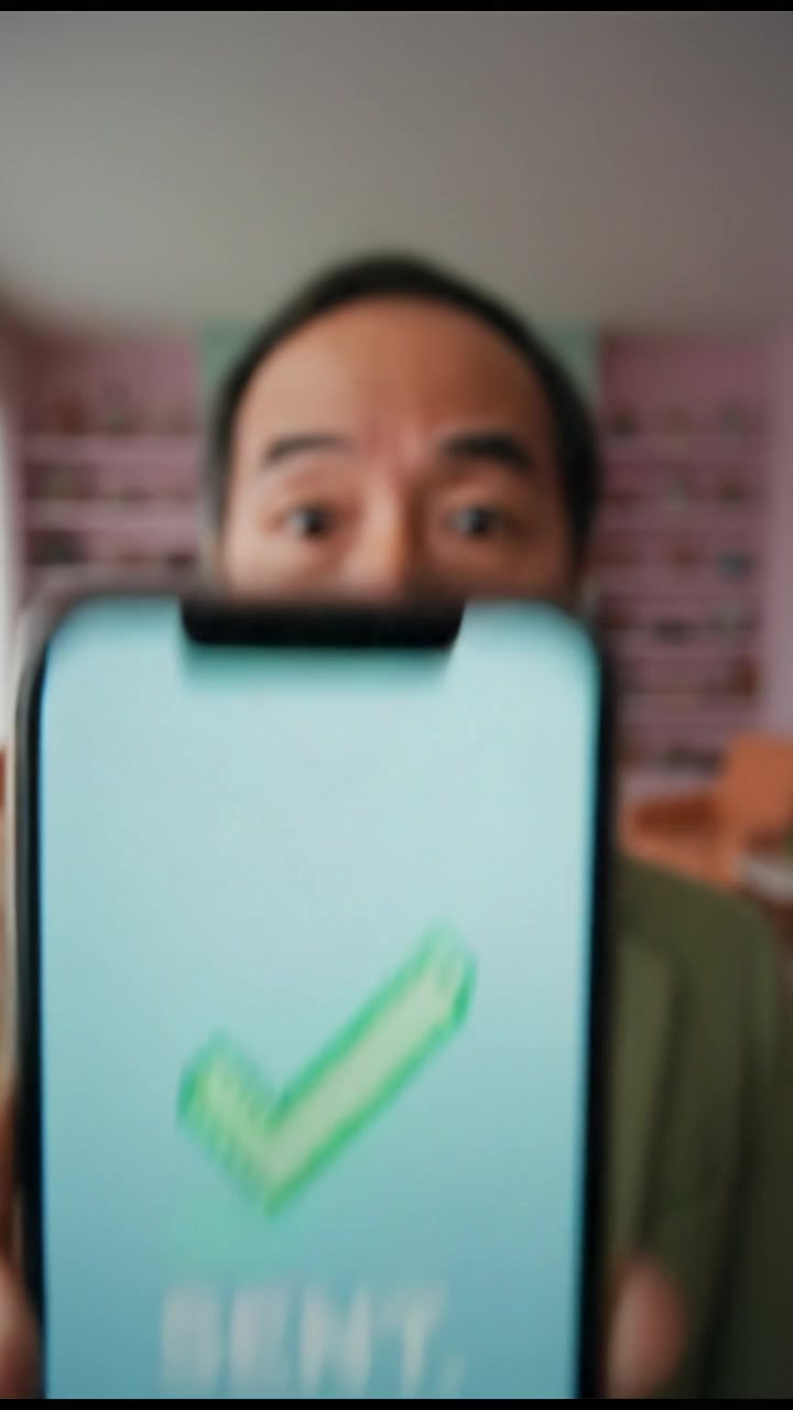 A close-up of the smartphone screen displaying a 'sent' notification, while Hiro looks shocked.